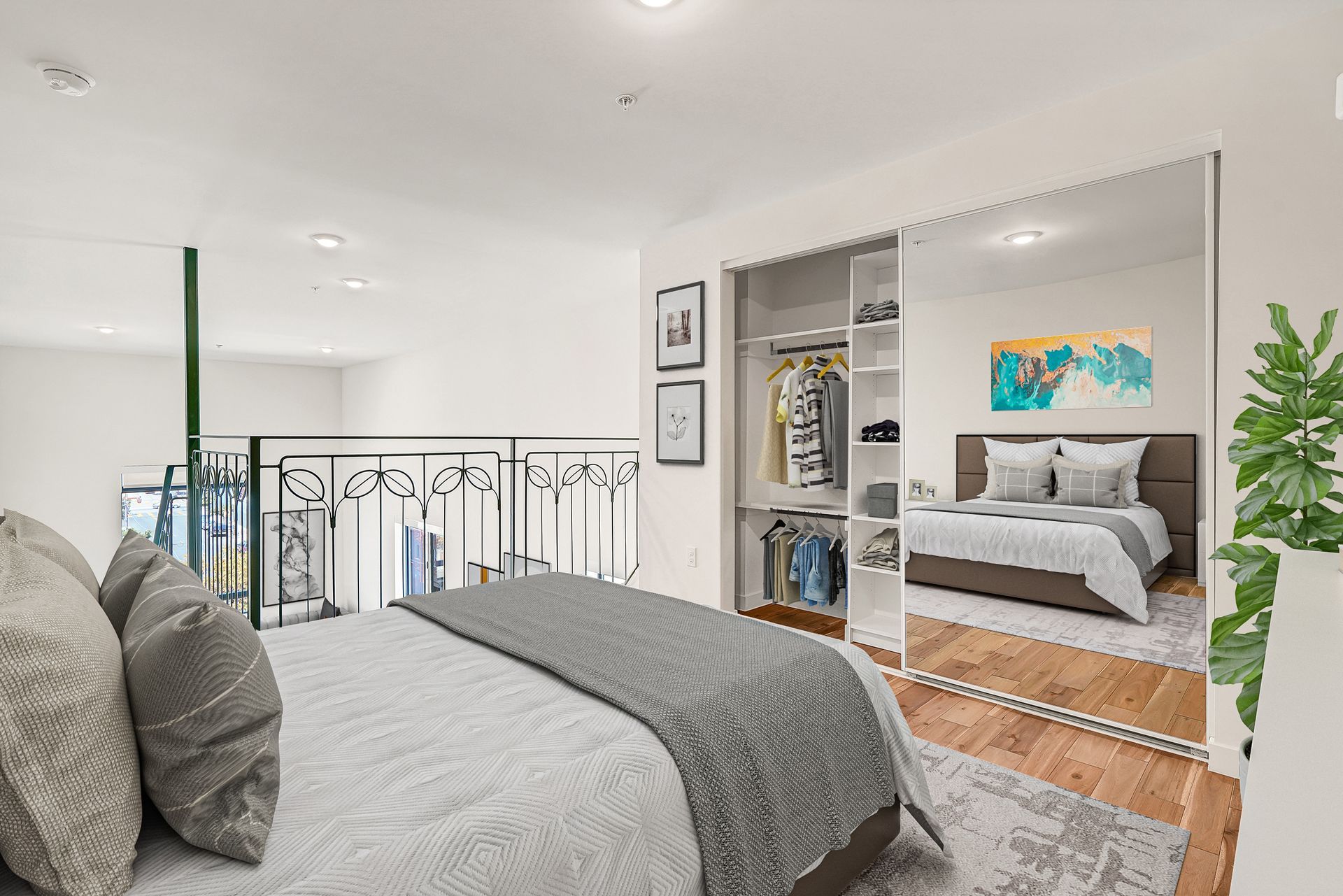 A bedroom with a large bed and a closet.