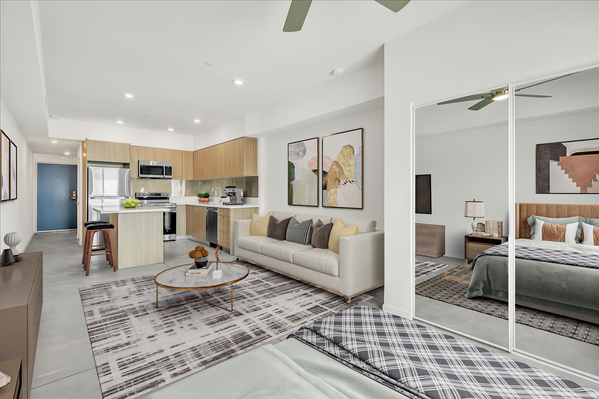 Studio,  A living room with a couch , coffee table , and a bed.