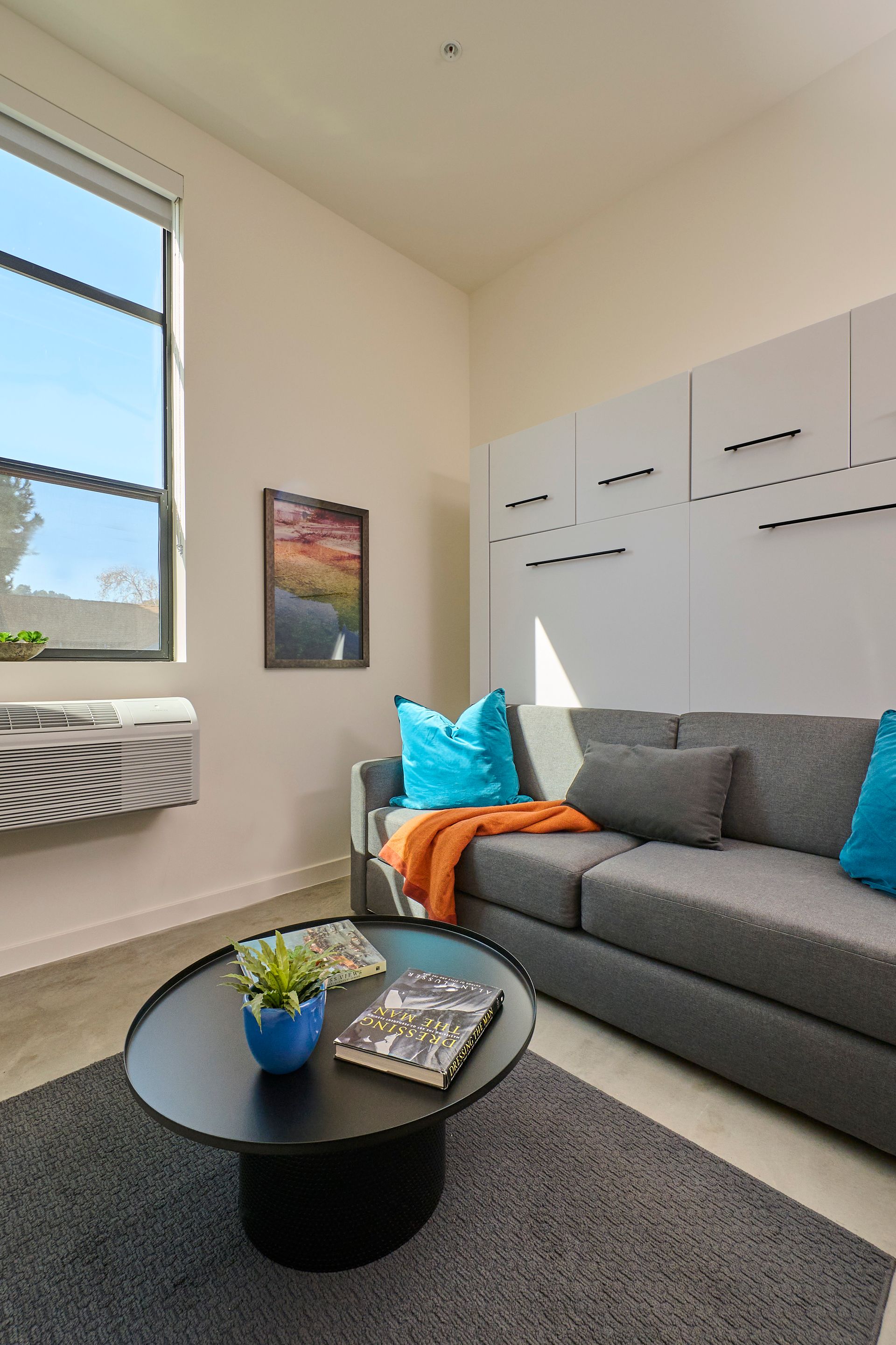 A living room with a couch and a coffee table