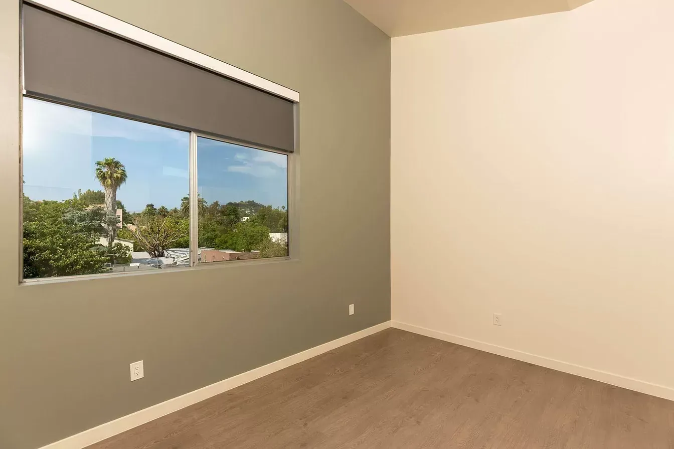 There is a large window in the middle of the room.