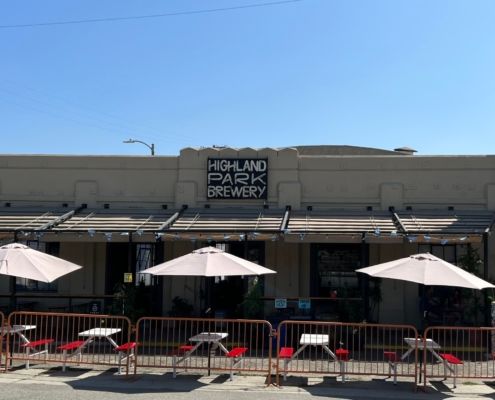 Highland park brewery has tables and umbrellas outside