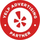 A yelp advertising partner badge with a star in the center