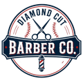 Diamond Cut Barber Co logo featuring barber scissors, baseball stitching, and a classic barber pole in red, white, and blue.