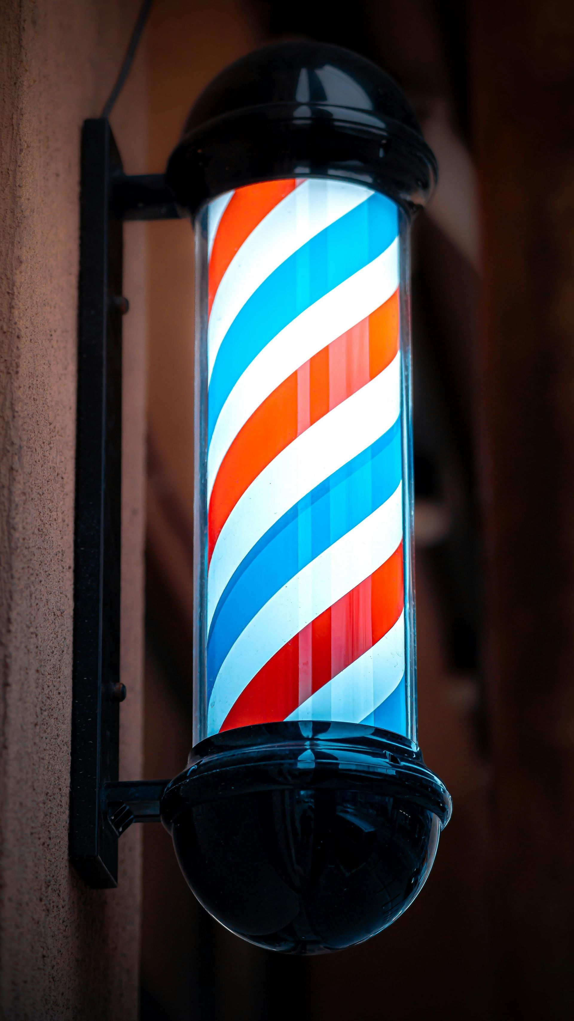 Barber working on a client's haircut