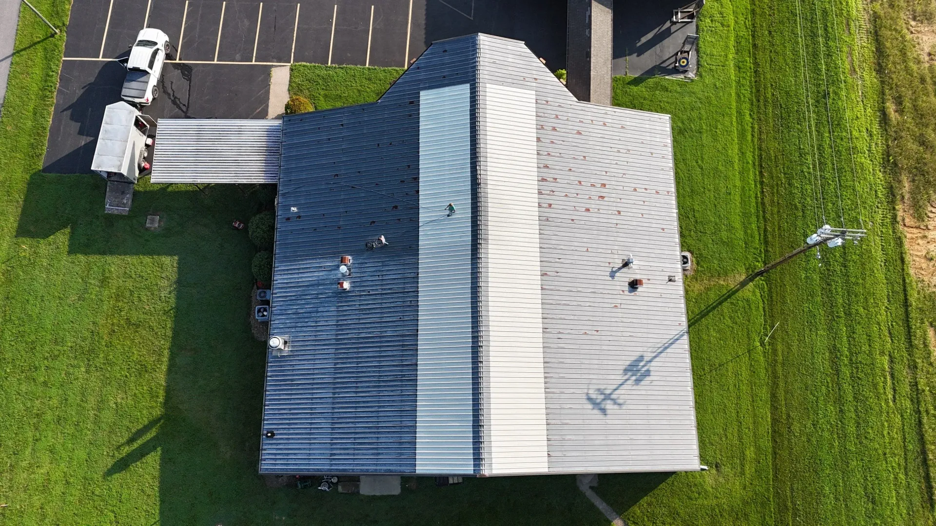 Aerial view of church metal roof before restoration in Madisonville, Kentucky