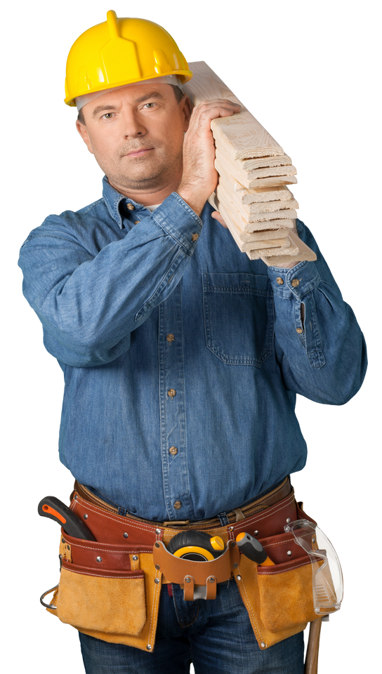 A man wearing a hard hat is holding a piece of wood