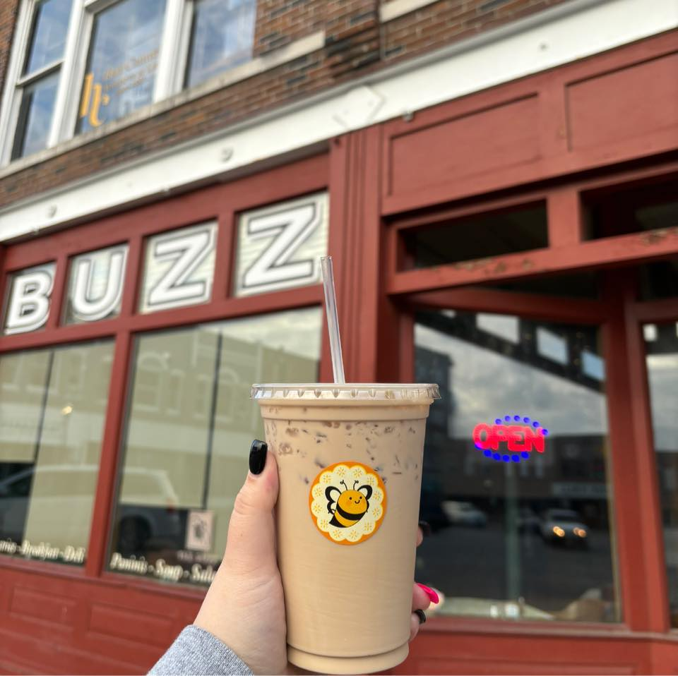 Person holding iced coffee from 