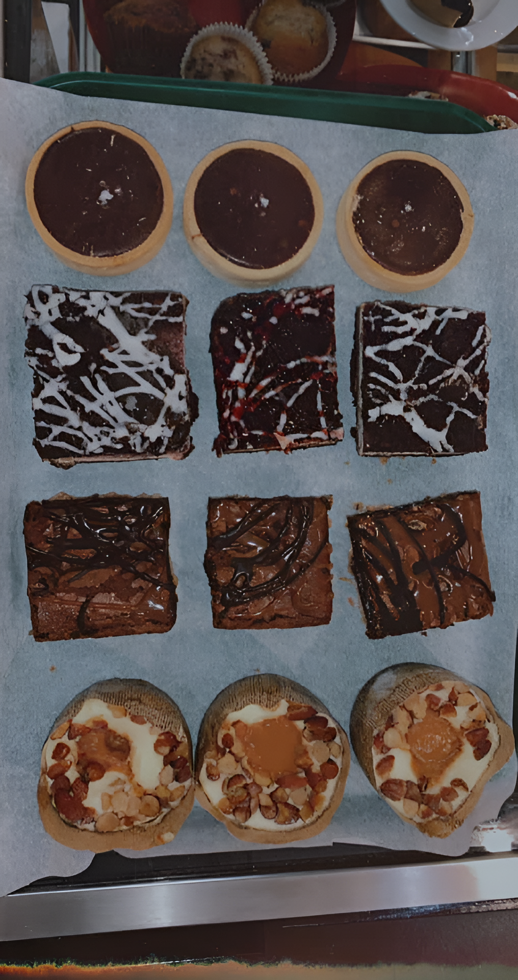 Tray of assorted desserts: Chocolate cookies, brownies, and pastries.
