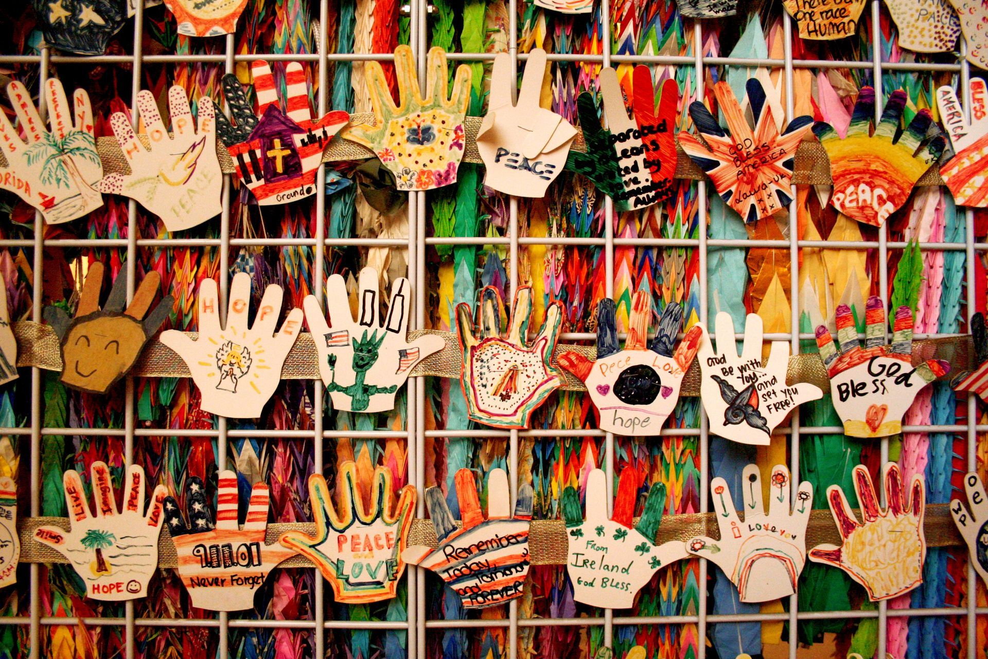 A wall with a bunch of hand crafts on it