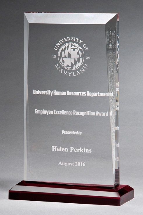 Classic acrylic recognition award with red highlights.