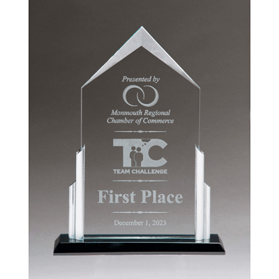 Clear glass recognition award with peak and silver posts.