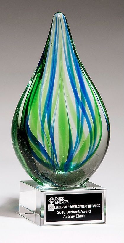 Droplet shaped blue and green art glass recognition award.