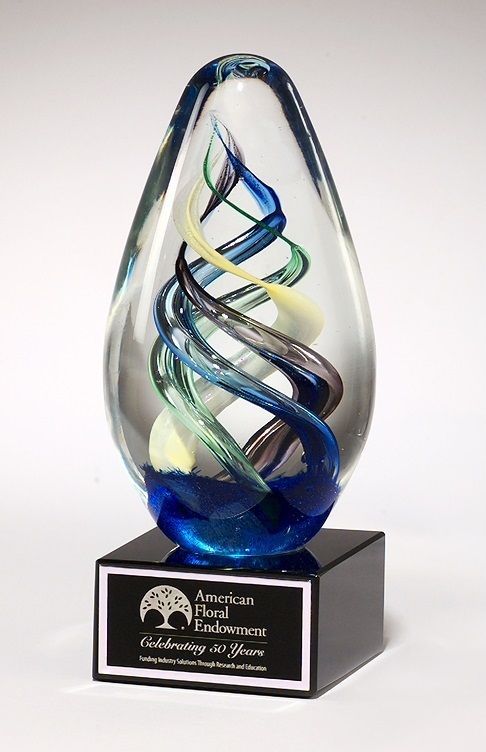 Egg shaped twist art glass recognition award.