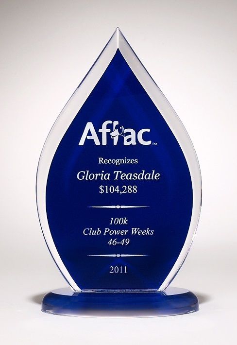 Clear and blue flame shape acrylic recognition award.