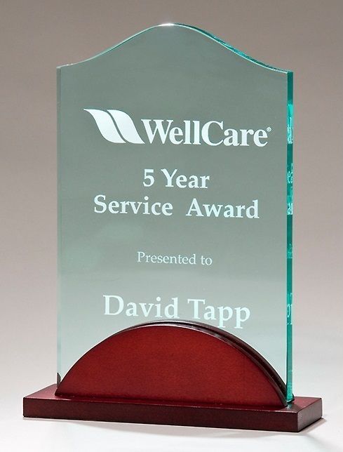 Tidal jade acrylic recognition award on mahogany finished base.
