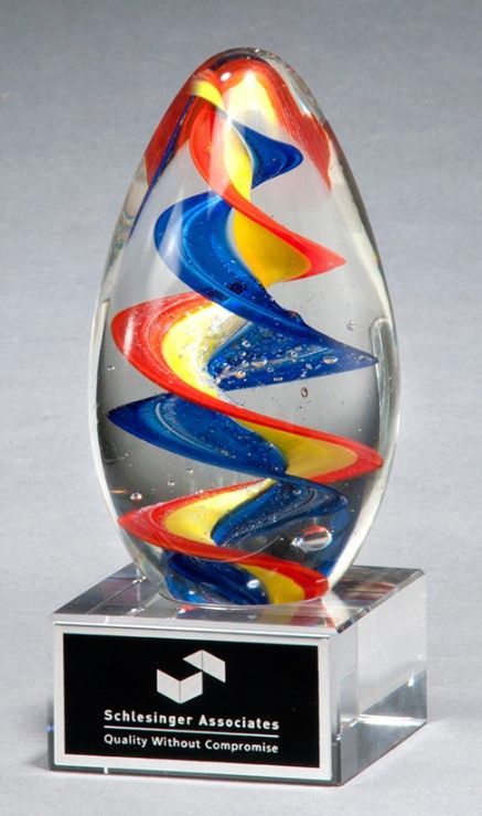 Colorful blue and orange egg shaped art glass recognition award.