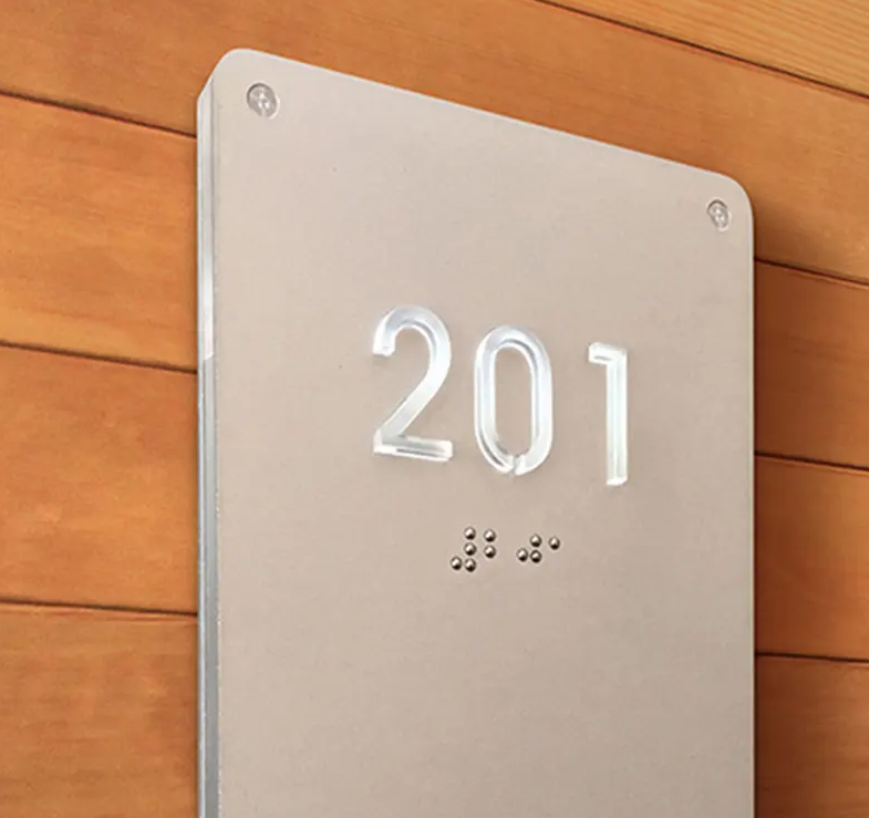 ADA compliant raised letter/braille room or suite signs.