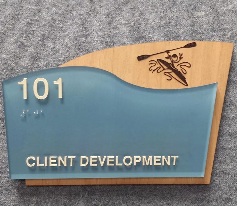 Office door sign with braille.