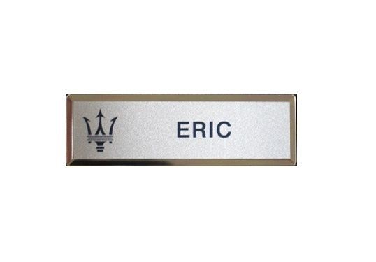 Laser engraved silver name badge on small premier gold frame.