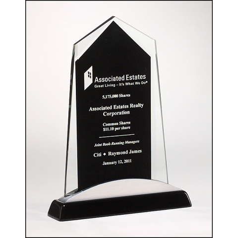 Glass recognition award with black background.