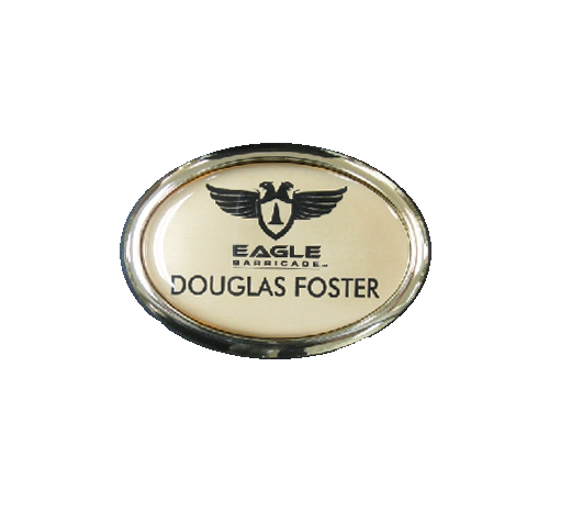 Laser engraved and protective domed name badge in a gold oval frame.