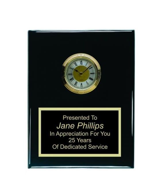 Black piano finish recognition award plaque with ornate clock and plate.