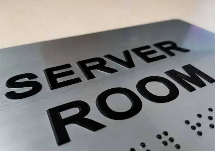 ADA compliant raised letter/braille room signs.