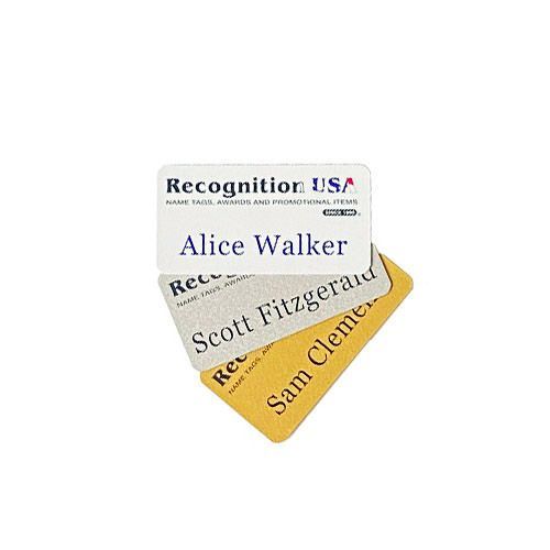 Thermal printed name badges made from white, silver, and gold plastic.