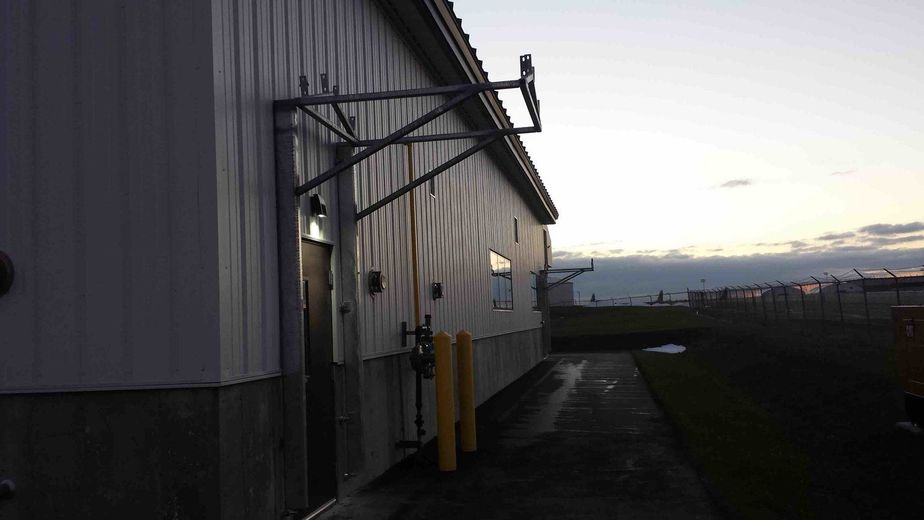 A building with a canopy on the side of it