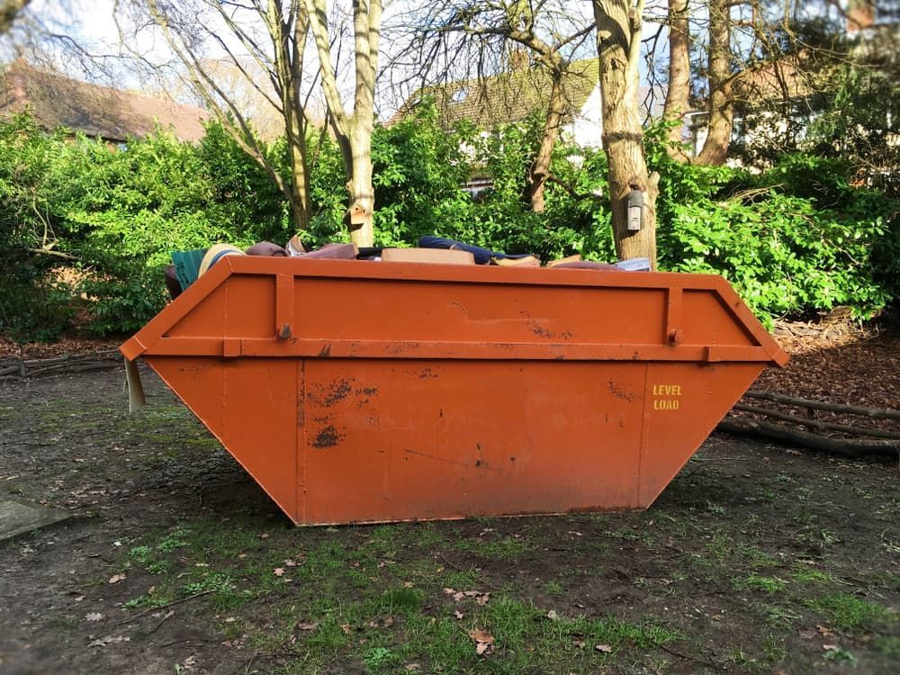 Orange Metal Bin - Skip Hire in Port Stephens