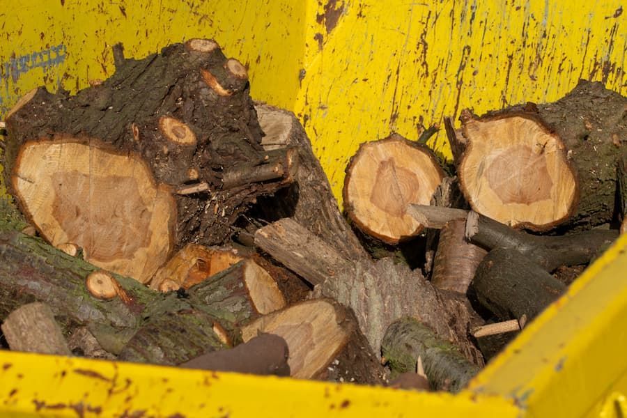 Yellow Skip Loaded With Rubble And Wood - Skip Bin Hire in Medowie, NSW