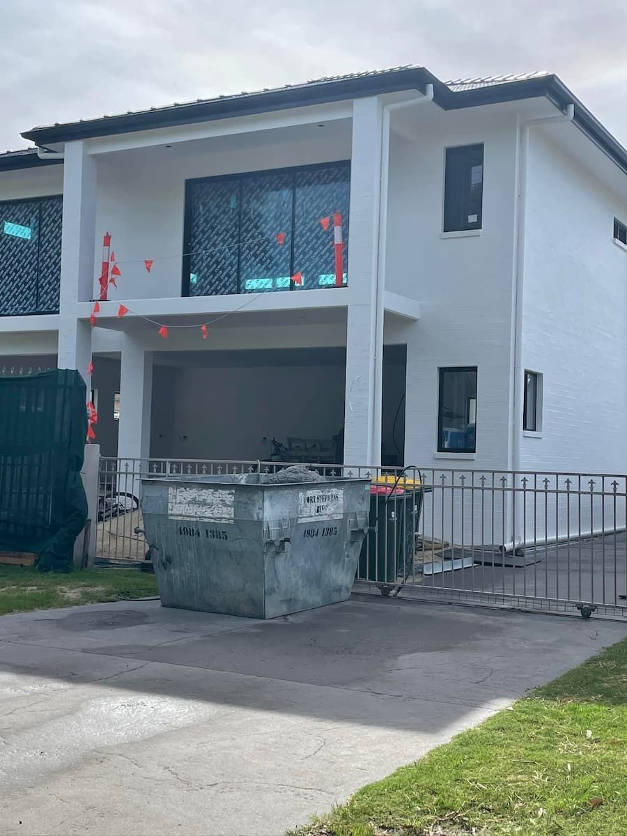 Skip Bin In Front Of a New Build House - Waste Categories in Port Stephens