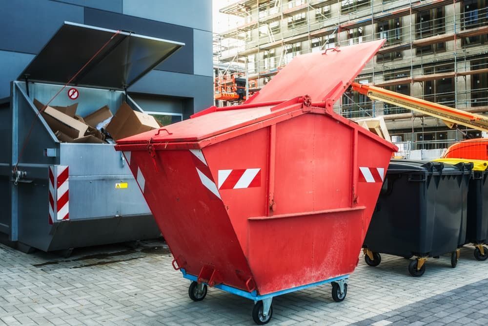 Red Dumpster And Garbage Bin on the Construction Site - Skip Hire in Port Stephens Red Dumpster And Garbage Bin on the Construction Site - Skip Hire in Port Stephens