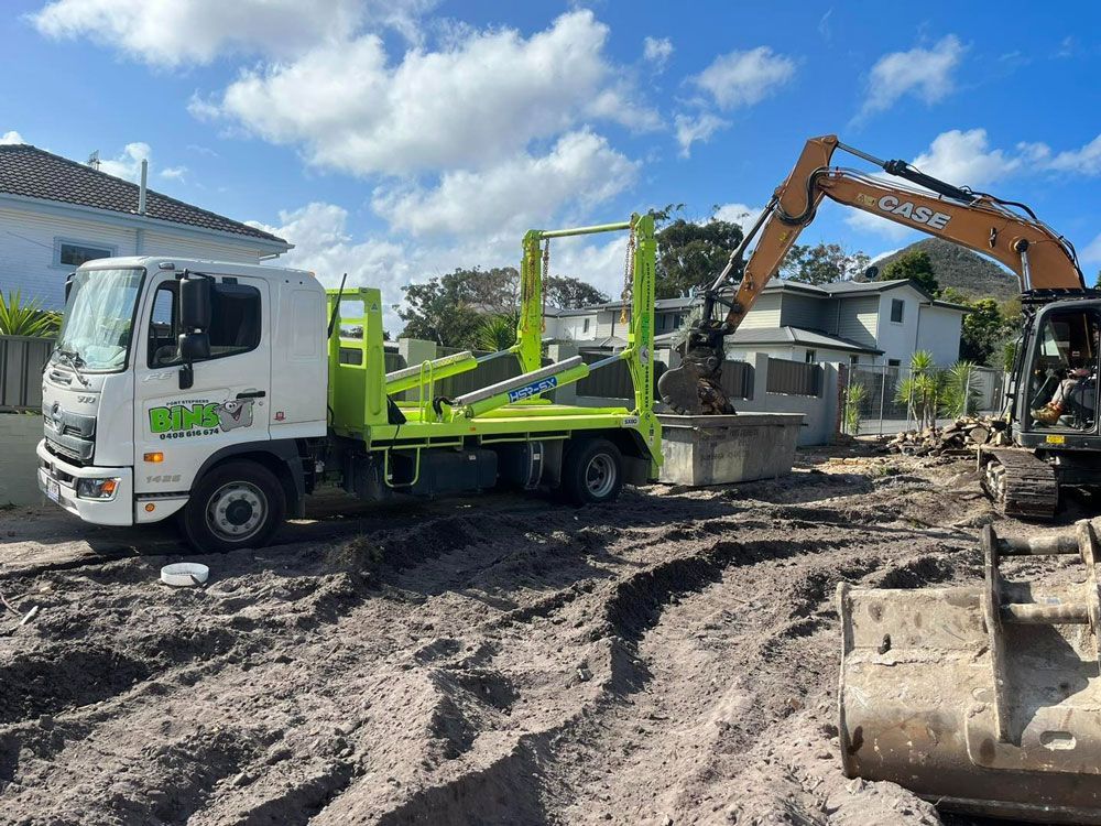 An Overfilled Green Skip Bin An Overfilled Green Skip Bin