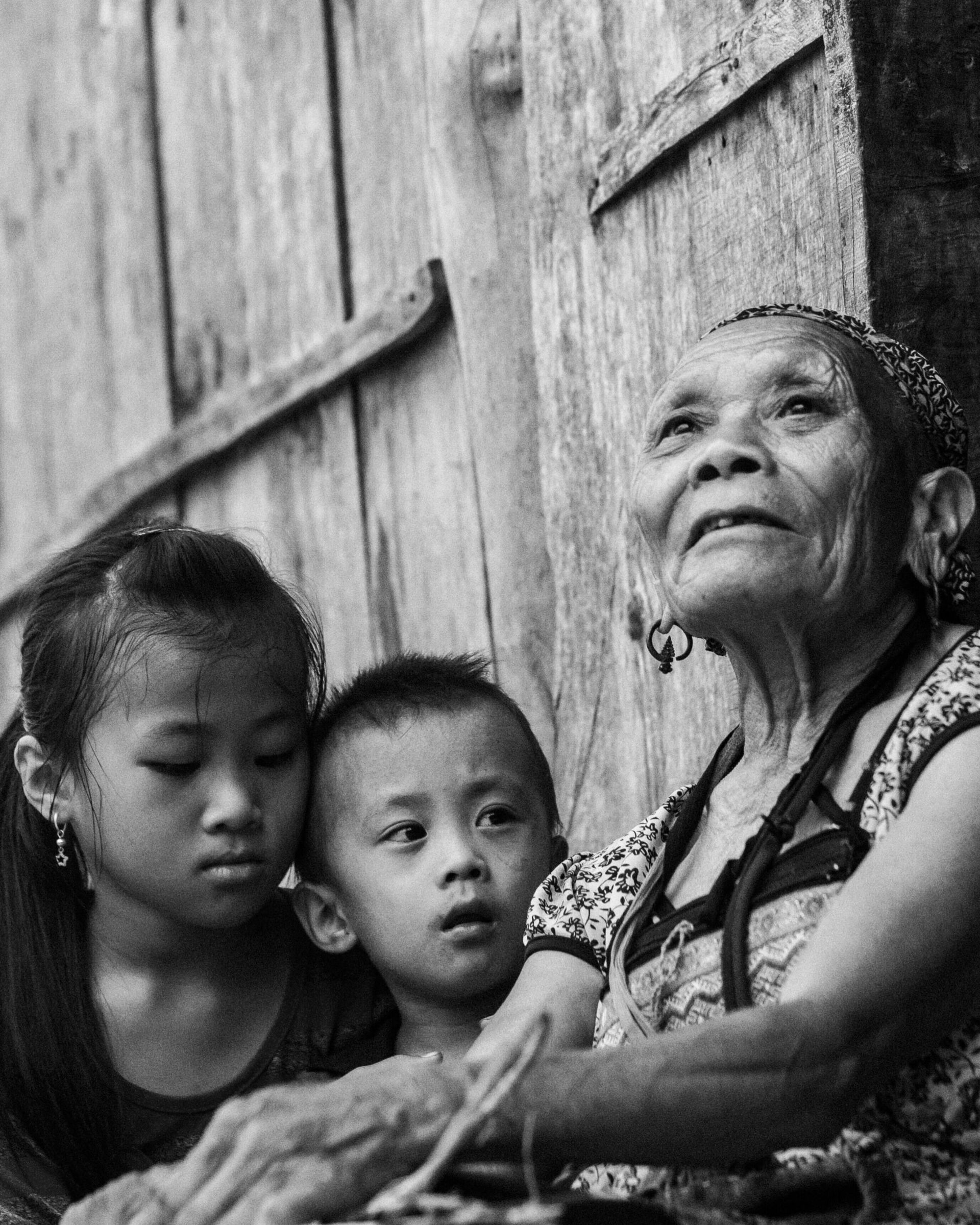 Aging is nature’s imprint etched in skin, carried through gaze, and reflected in generational bond.