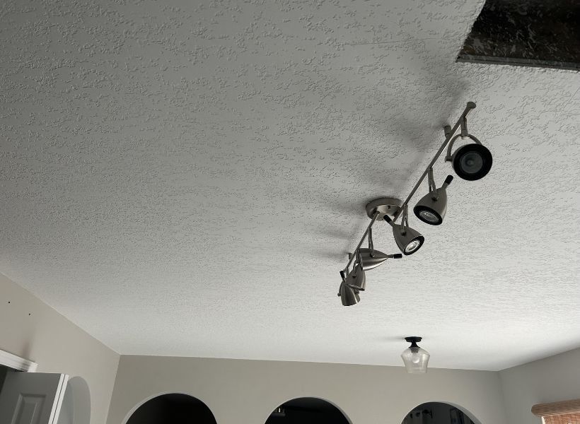 Tacking AC leak water damage restoration