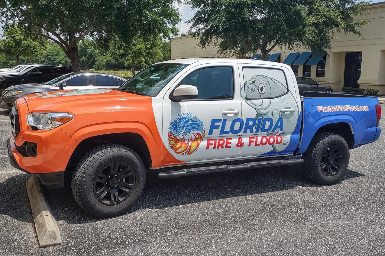 Florida Fire Flood company truck in Davenport, FL, providing water damage restoration services.