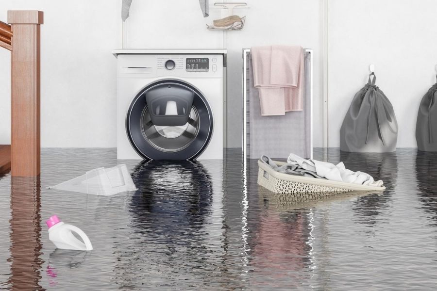 Flooded laundry room from washing machine overflow
