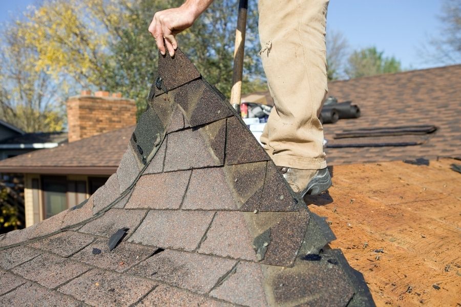 Roof damage being prepared for insurance inspection