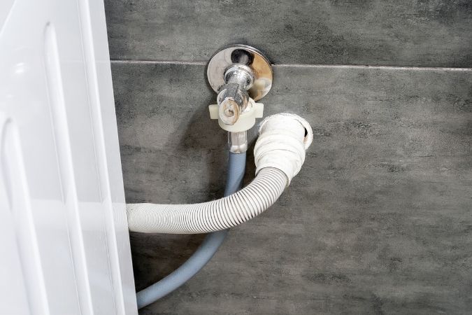 Washing machine supply hose connection prone to high water pressure failure