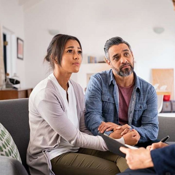 Couple Listening to their Therapist