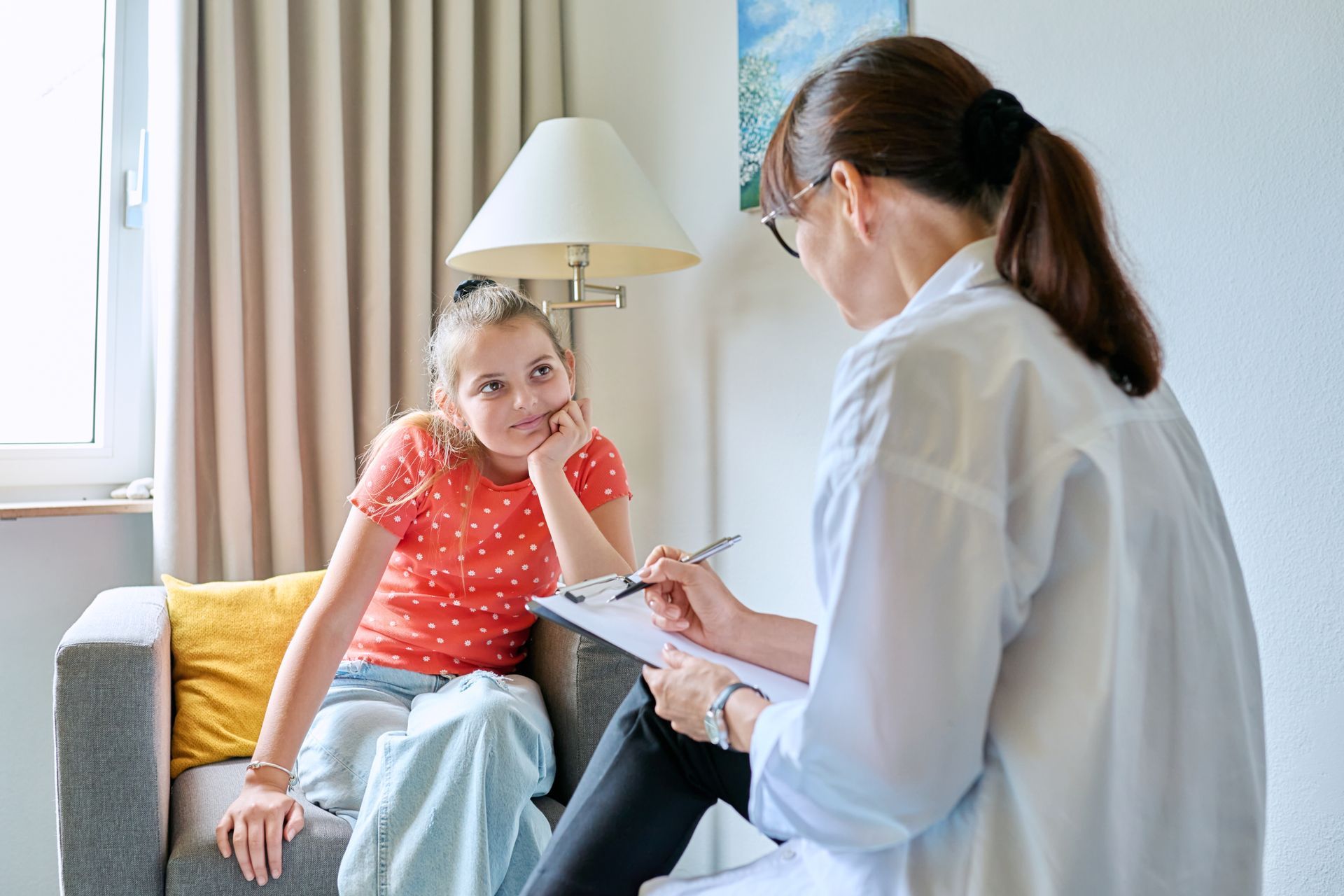 Kid Looking at Her Therapist