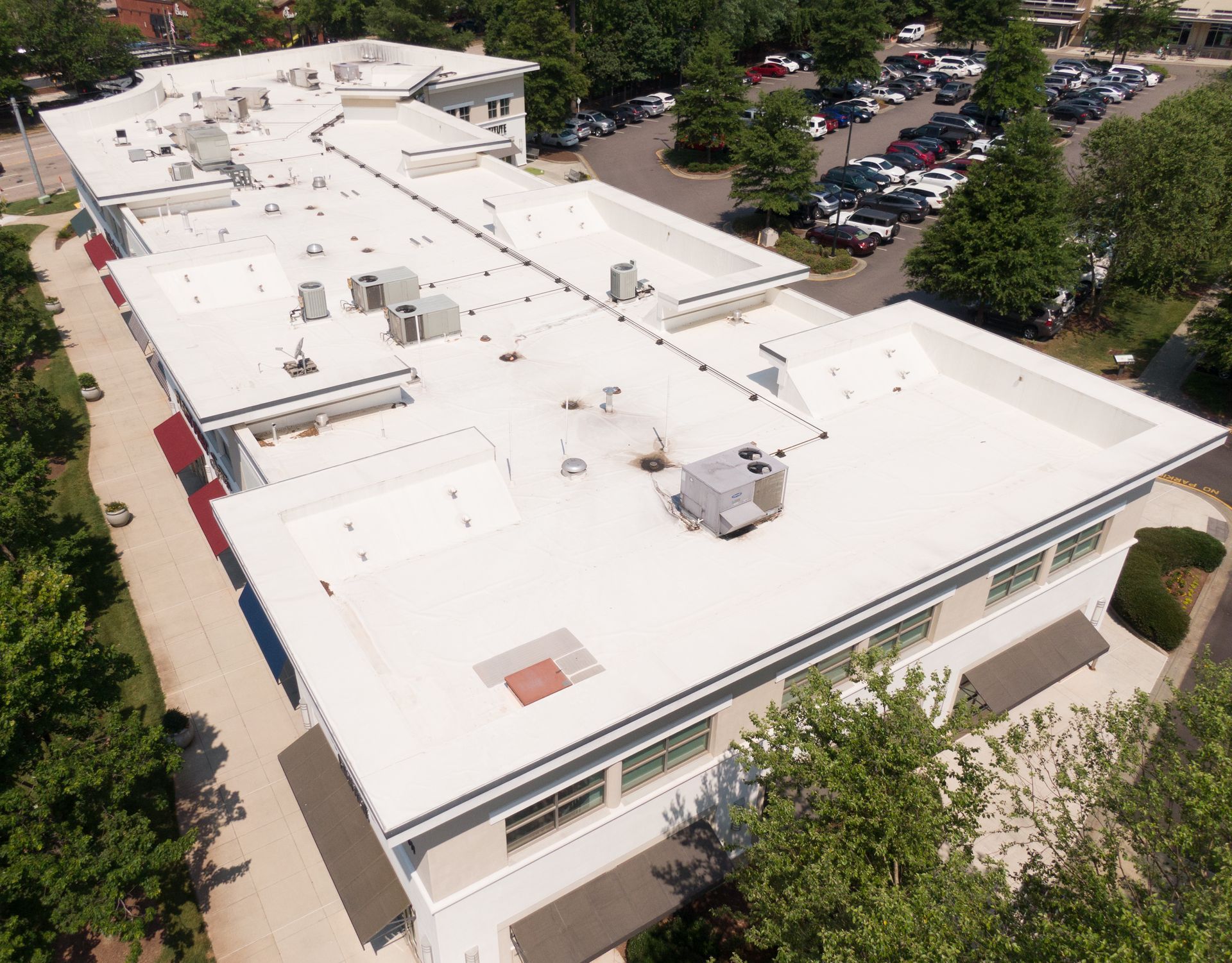 Aerial view of completed flat roof installation on a commercial building in Middle Tennessee