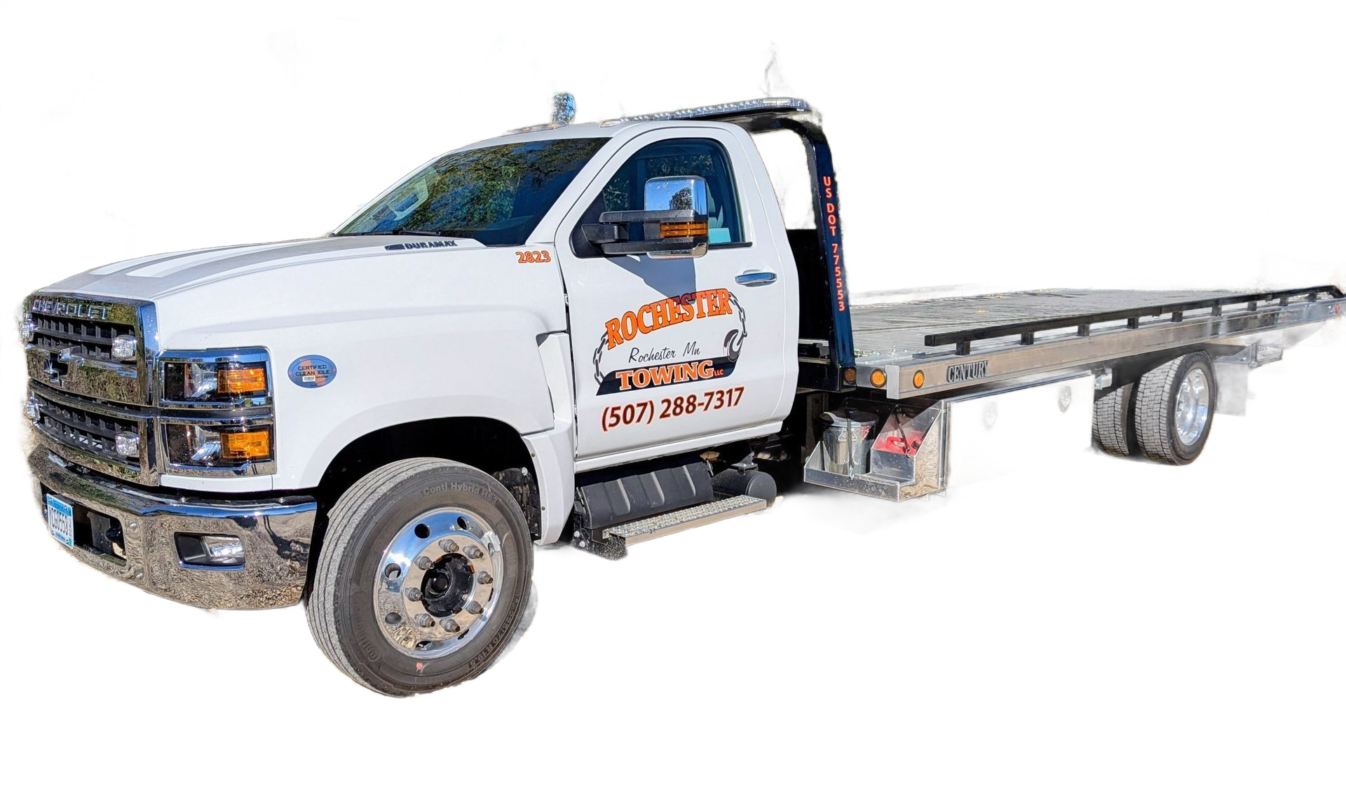 White tow truck with flatbed, company logo on the door.