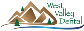Logo for West Valley Dental: brown mountains, green trees and text, blue water.
