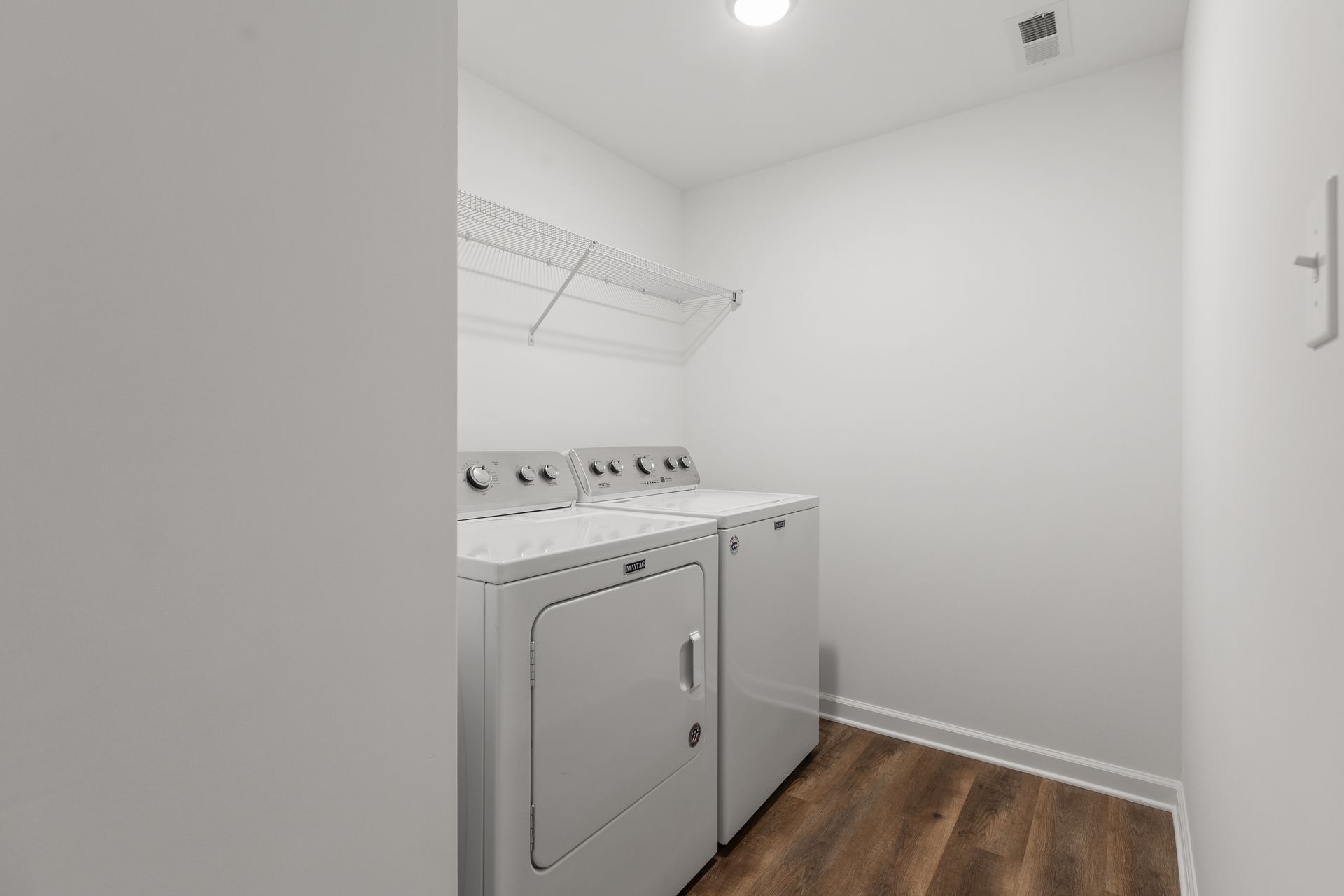 Photo of a walk-in dryer/washer area