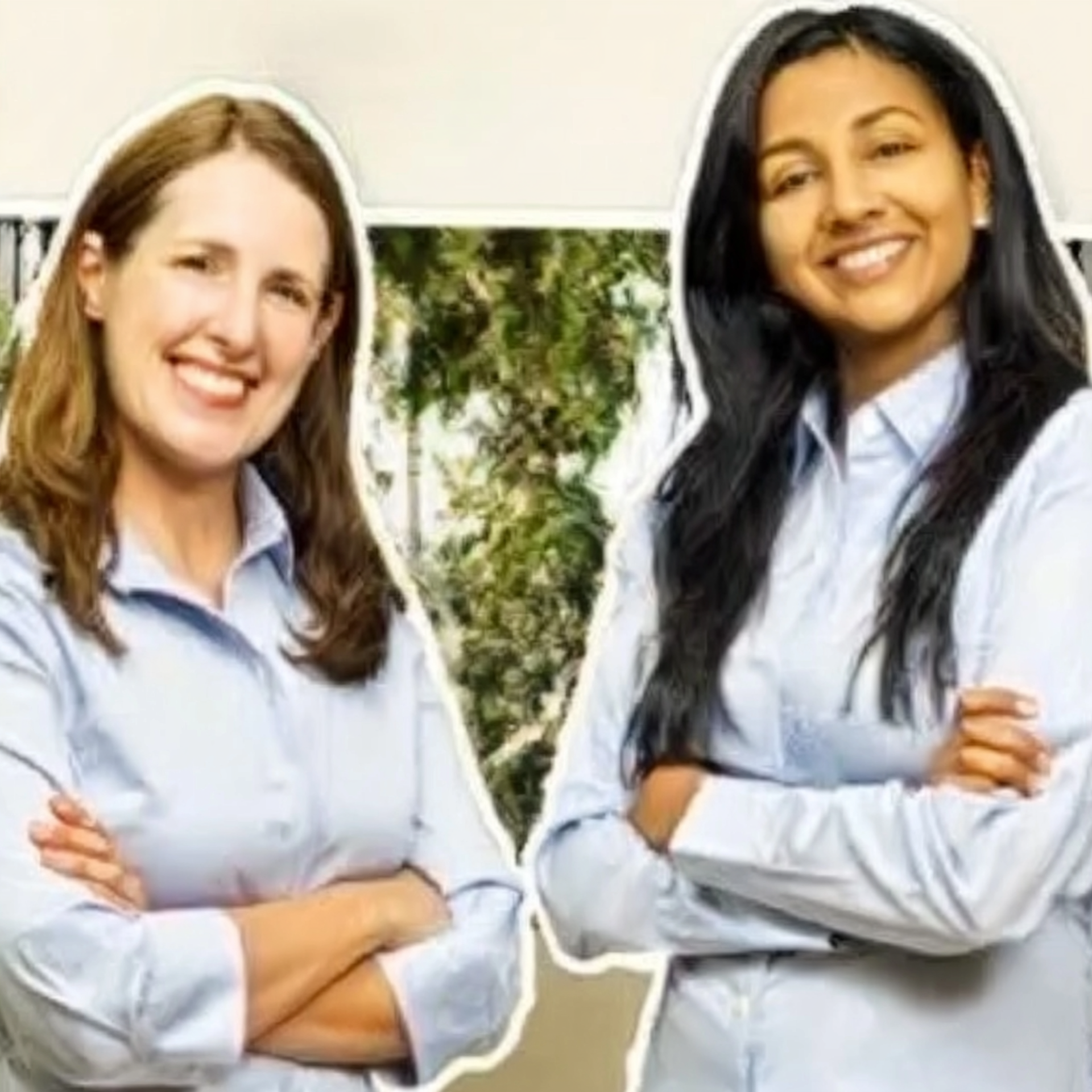 Two smiling professionals in light blue shirts standing with arms crossed in an office-like setting