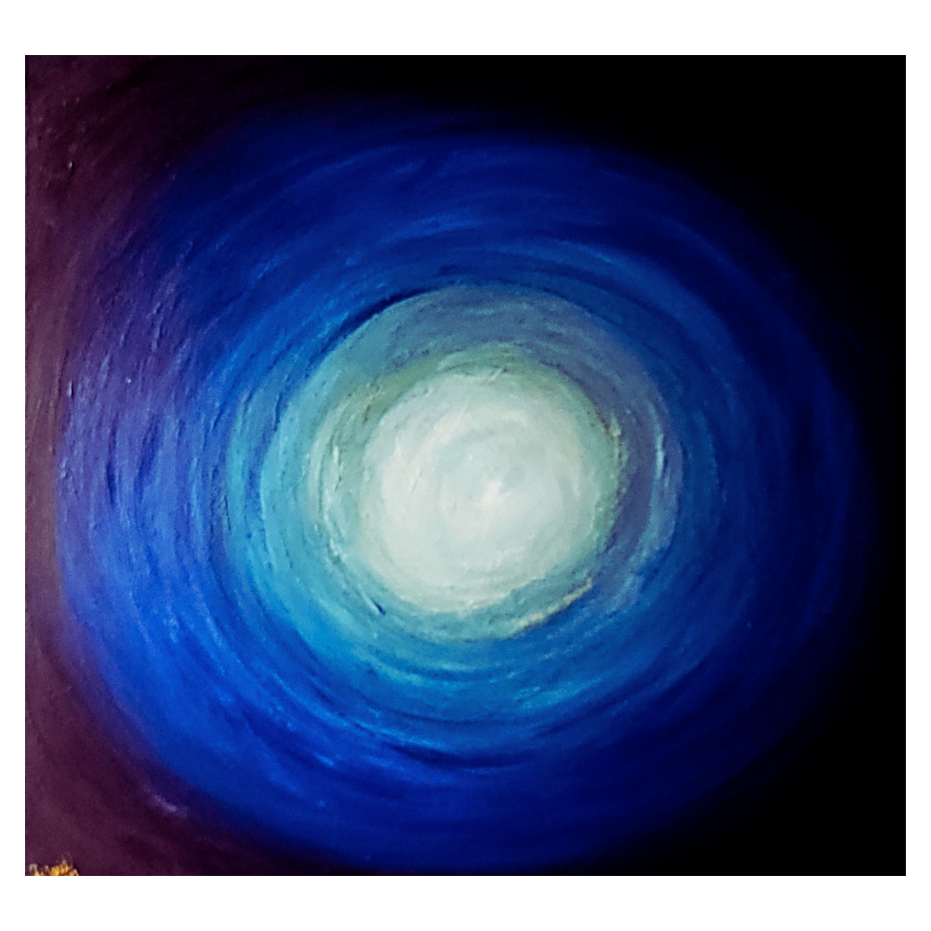 Abstract swirling blue and white spiral with a bright center on a dark background