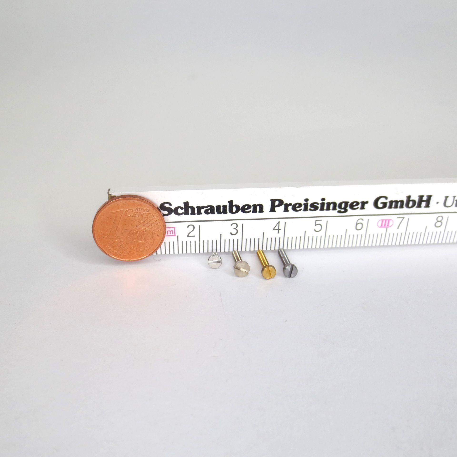A ruler that says schrauben preisinger gmbh on it