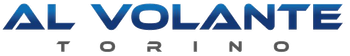 Logo per Al Volante Torino con testo blu in grassetto sopra la parola Torino in lettere maiuscole grigie più piccole.